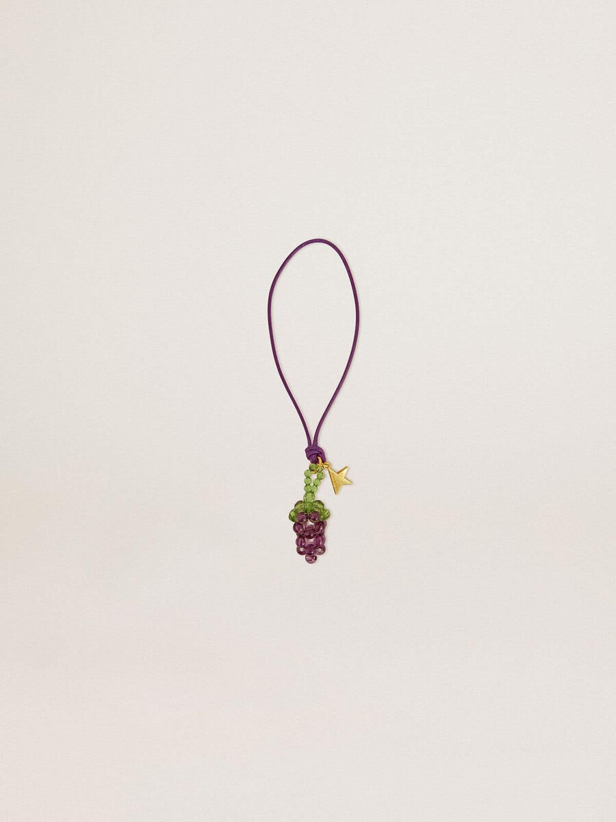 pingente de cacho de uvas roxas e verdes com estrela dourada