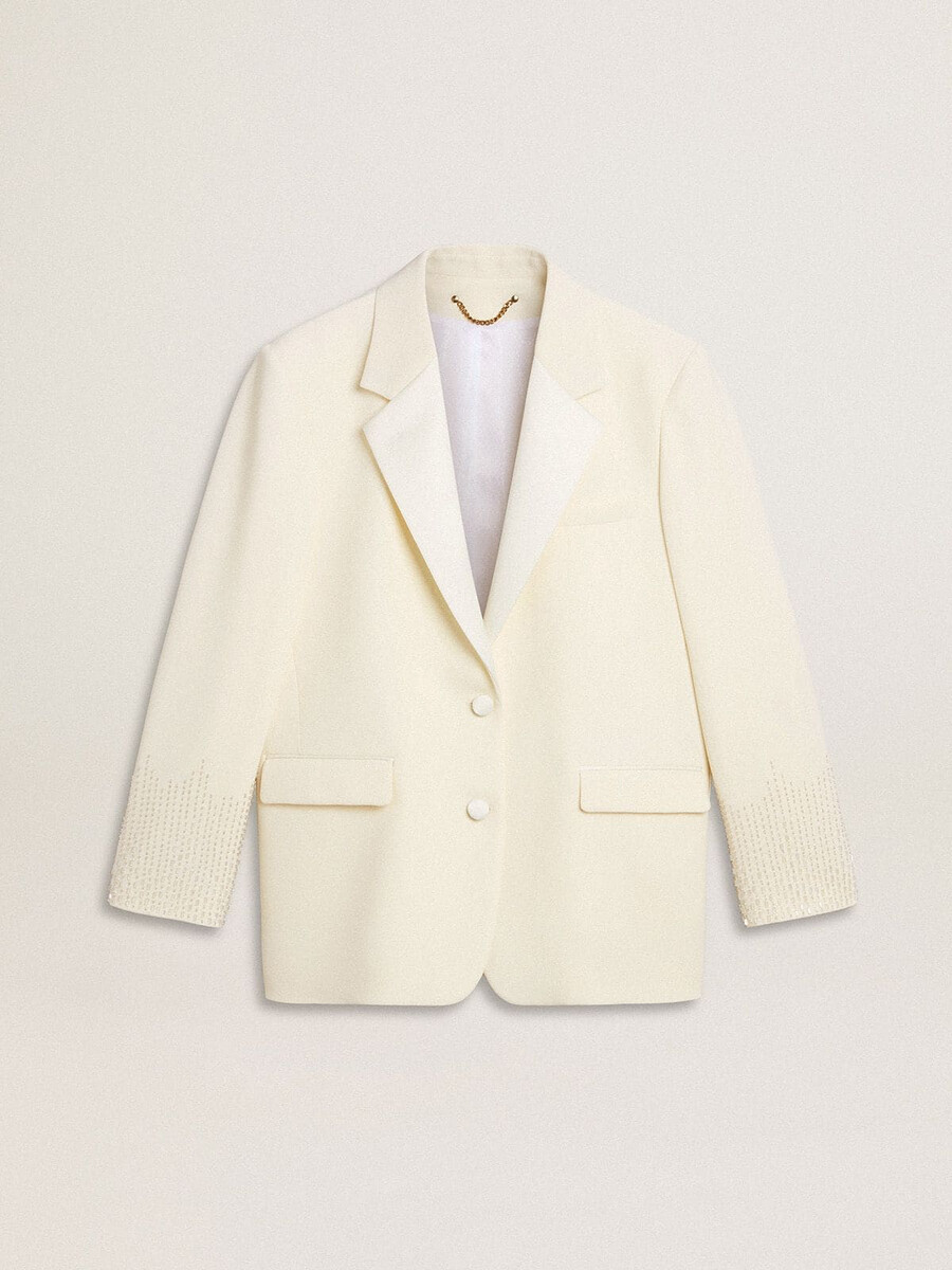 blazer oversized de abotoamento simples em branco com efeito seda e bordados.