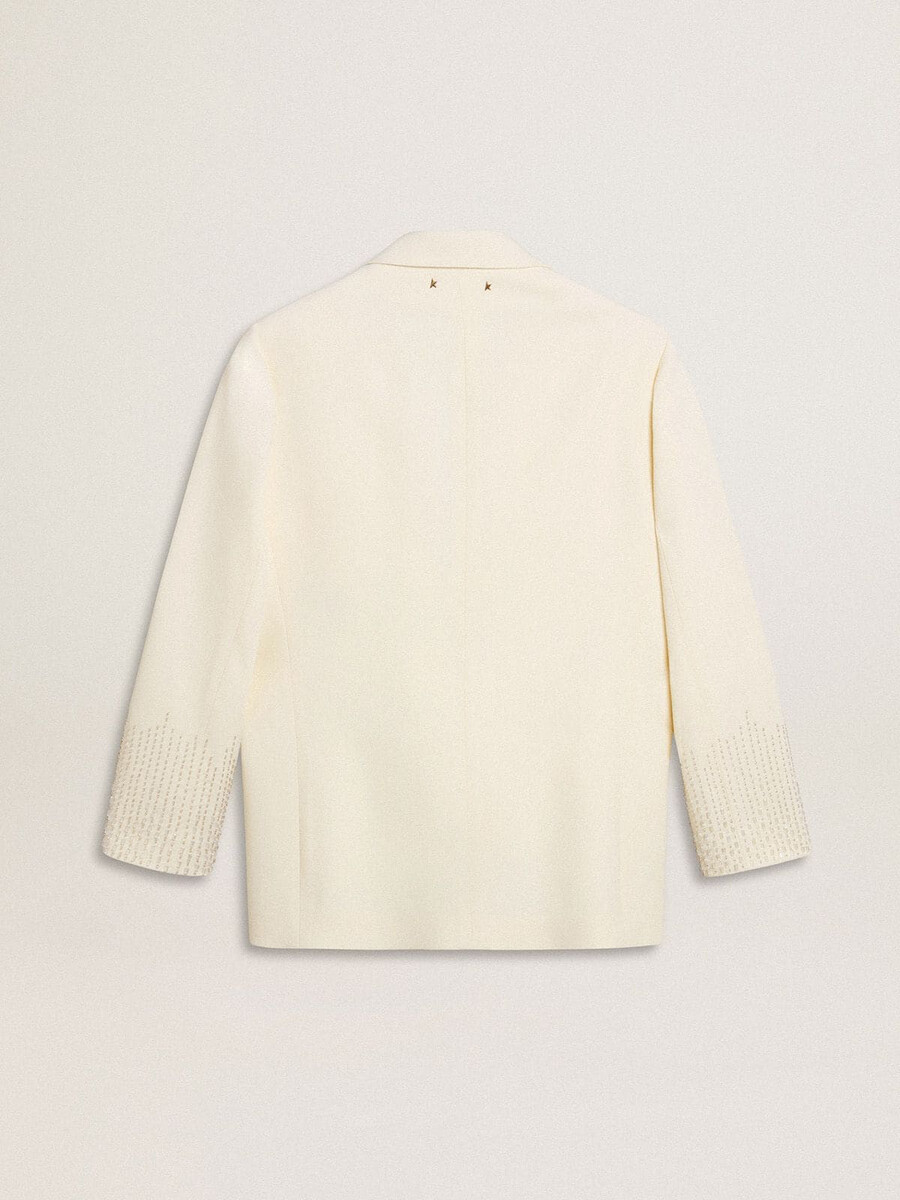blazer oversized de abotoamento simples em branco com efeito seda e bordados.