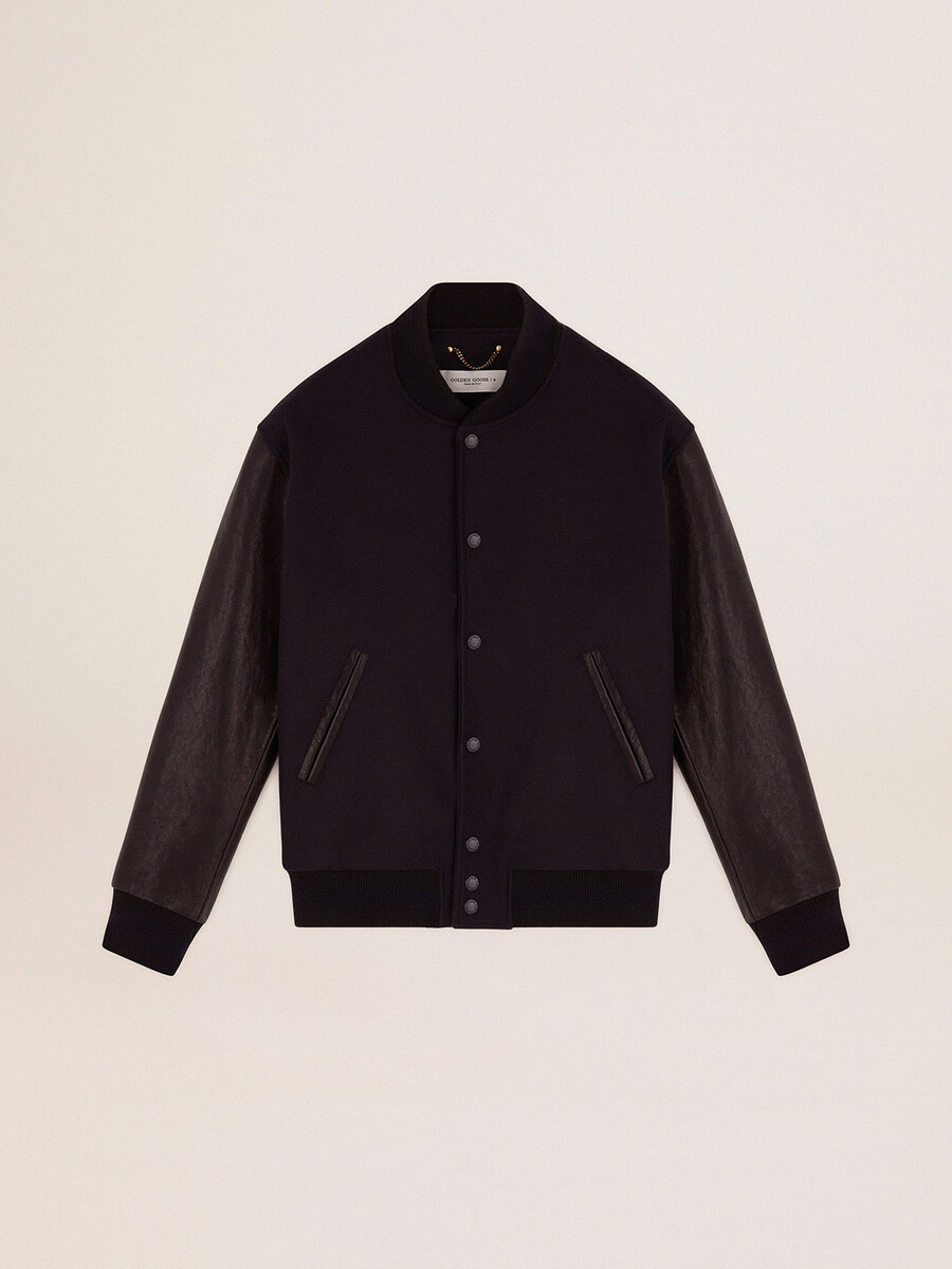 jaqueta bomber masculina em lã azul e couro preto.