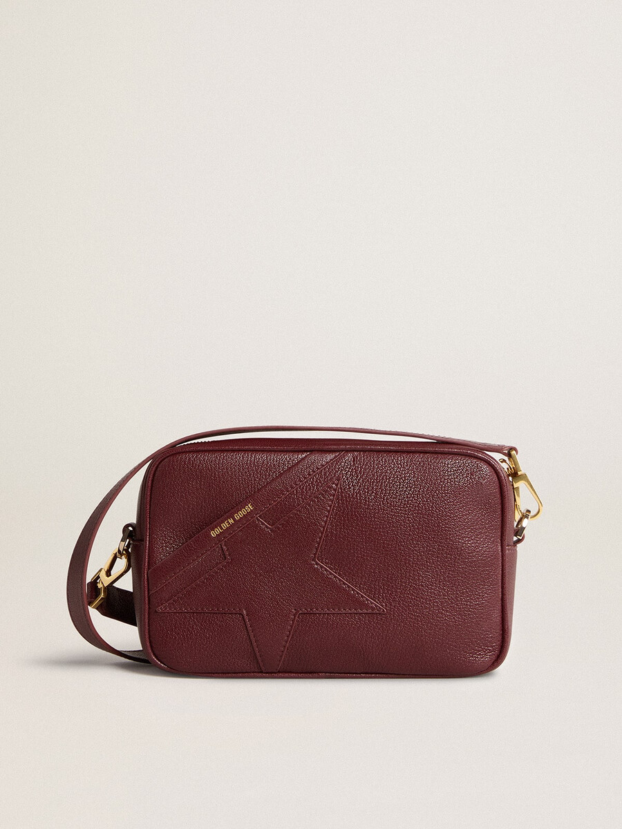 bolsa star em couro vermelho-vinho com estrela tom sobre tom