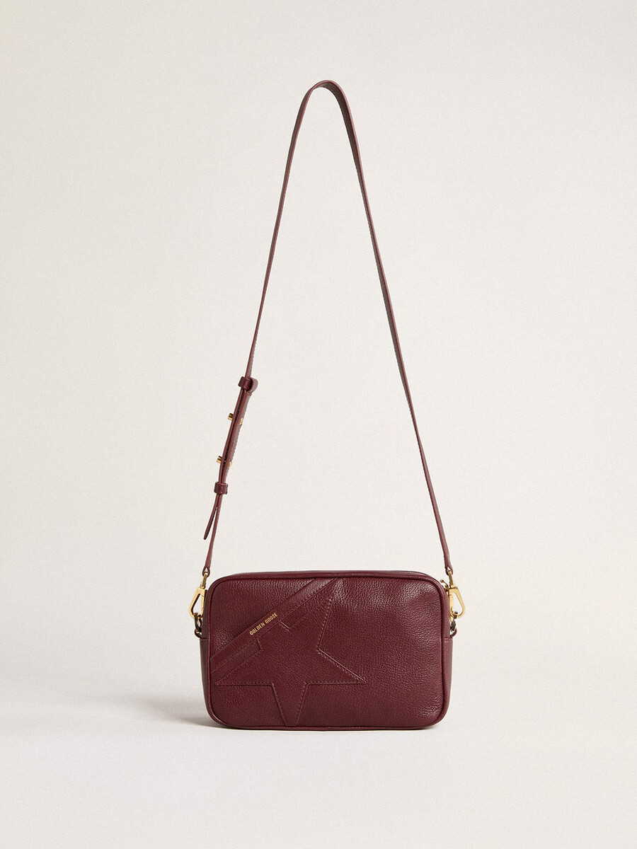 bolsa star em couro vermelho-vinho com estrela tom sobre tom
