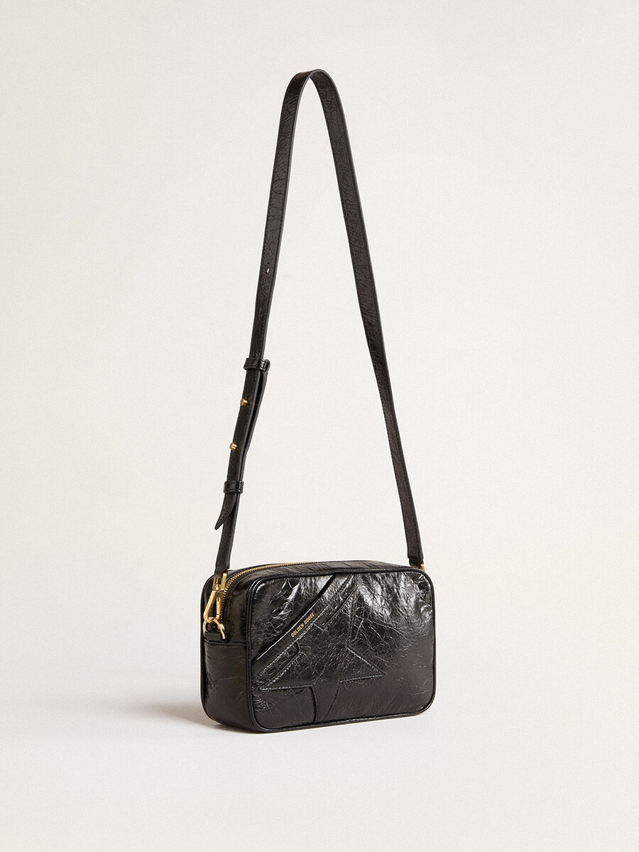bolsa star em couro preto brilhante com estrela tom sobre tom