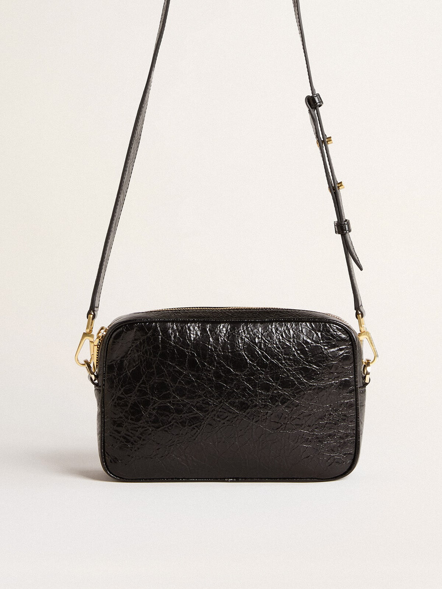 bolsa star em couro preto brilhante com estrela tom sobre tom