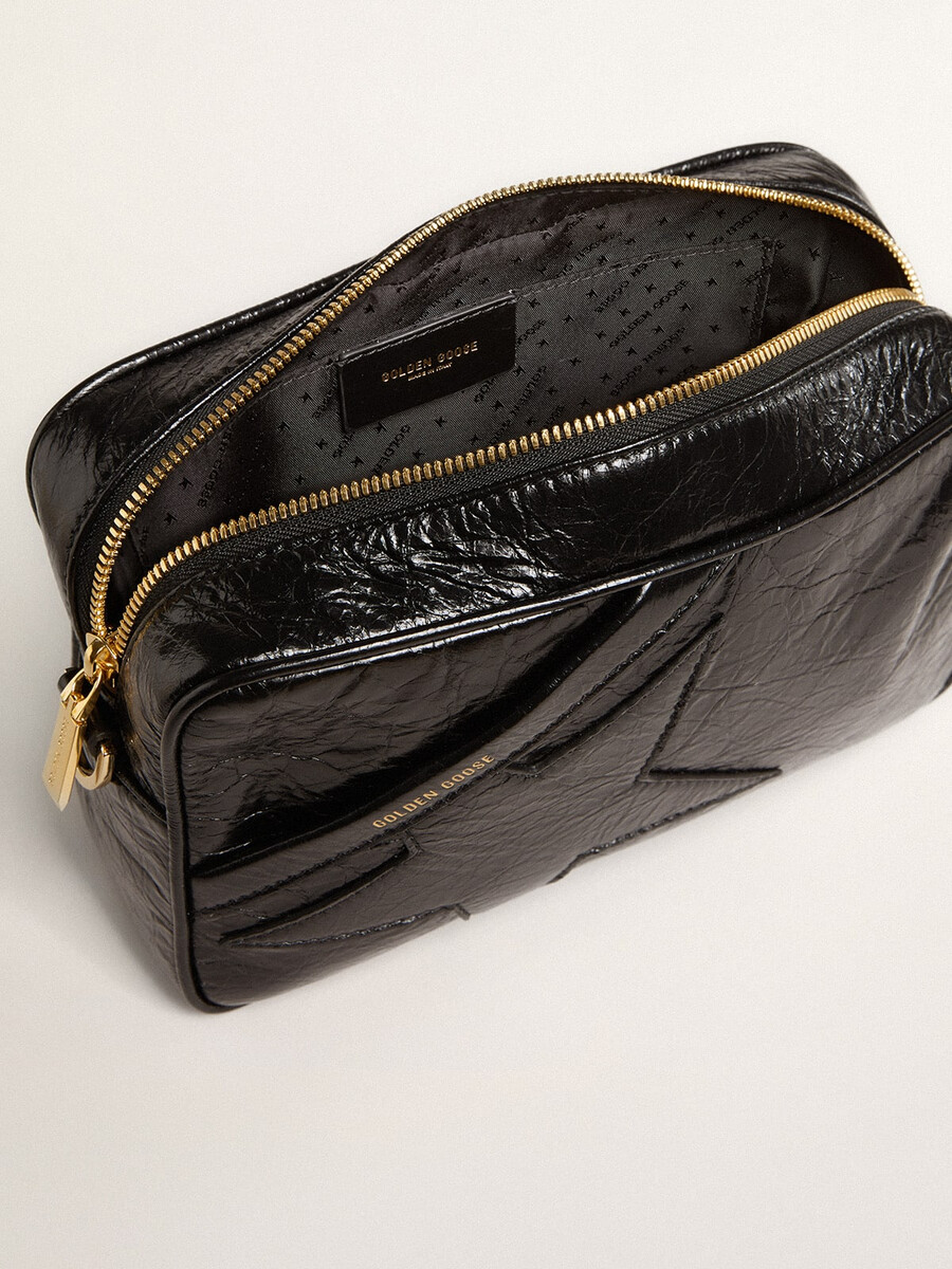 bolsa star em couro preto brilhante com estrela tom sobre tom