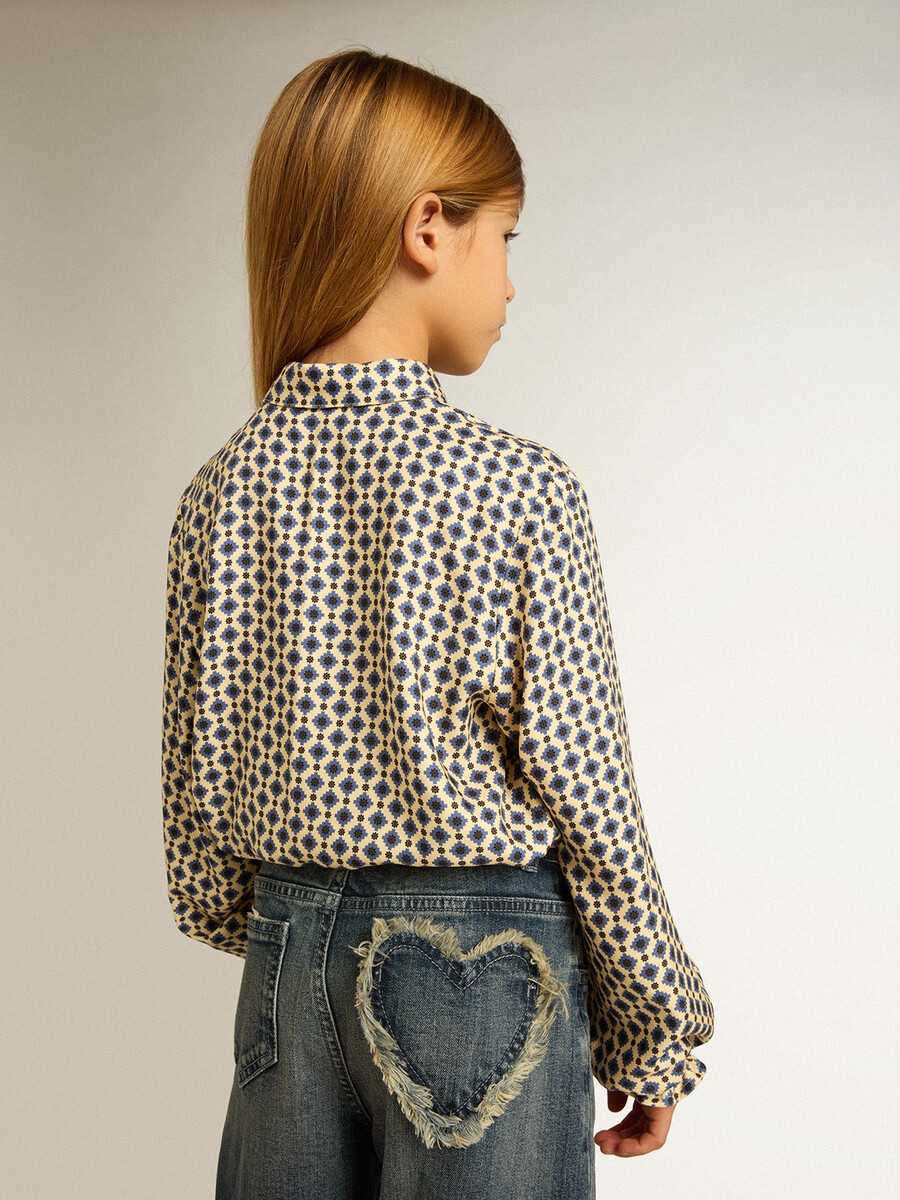 camisa polo feminina com estampa geométrica