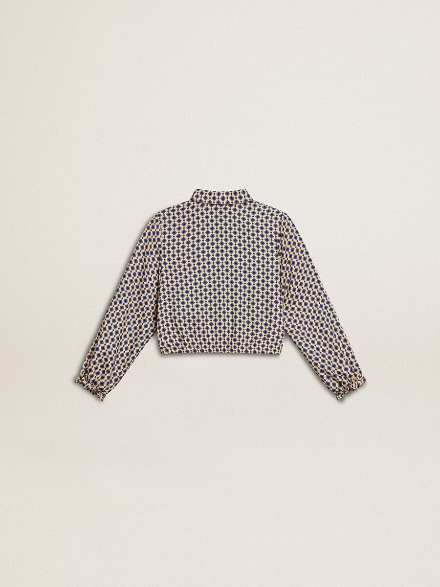 camisa polo feminina com estampa geométrica