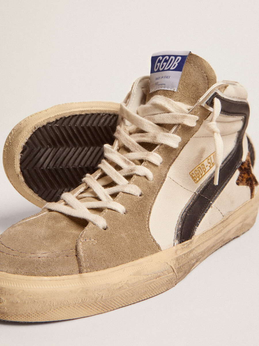 chinelo masculino com estampa de leopardo pele de pônei estrela e detalhes em preto.
