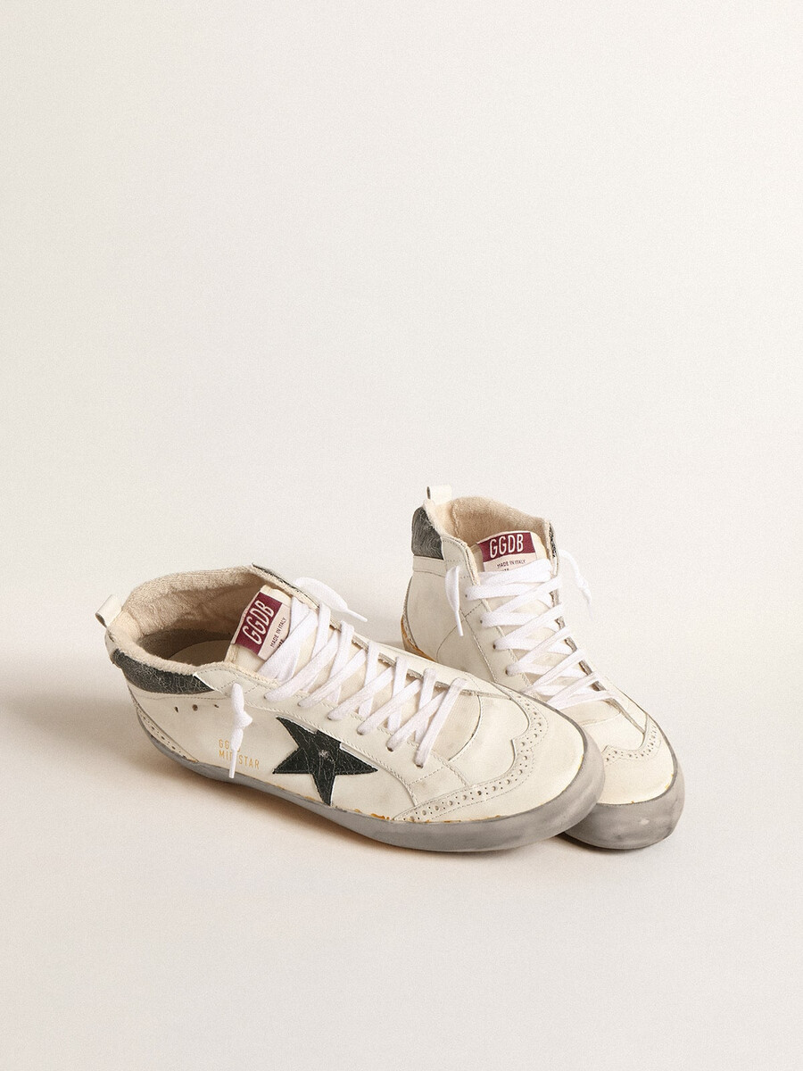 estrela mid star com estrela de couro metálico verde e flash branco