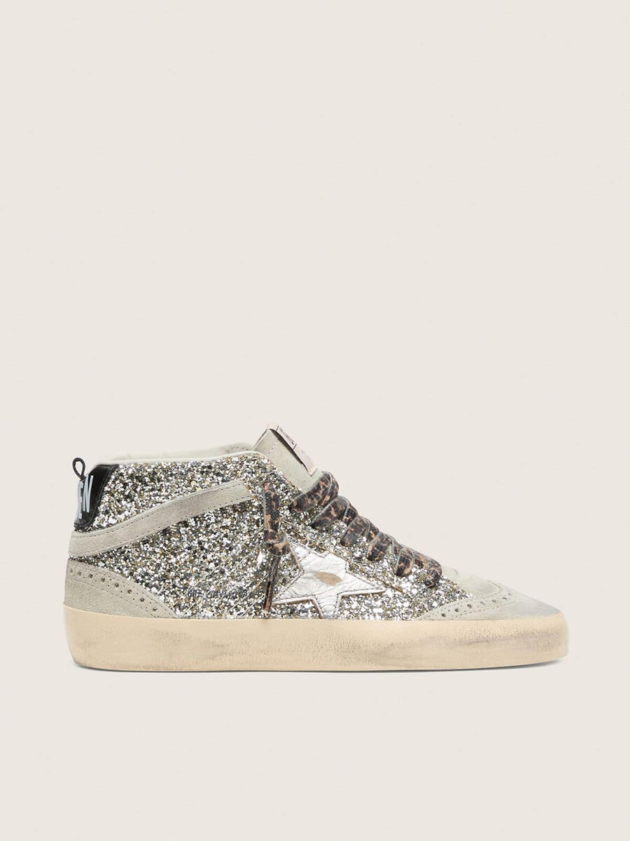 estrela mid star em glitter prateado com estrela de couro metálico prateado
