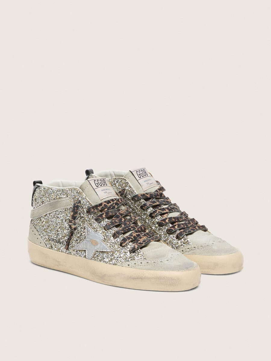 estrela mid star em glitter prateado com estrela de couro metálico prateado