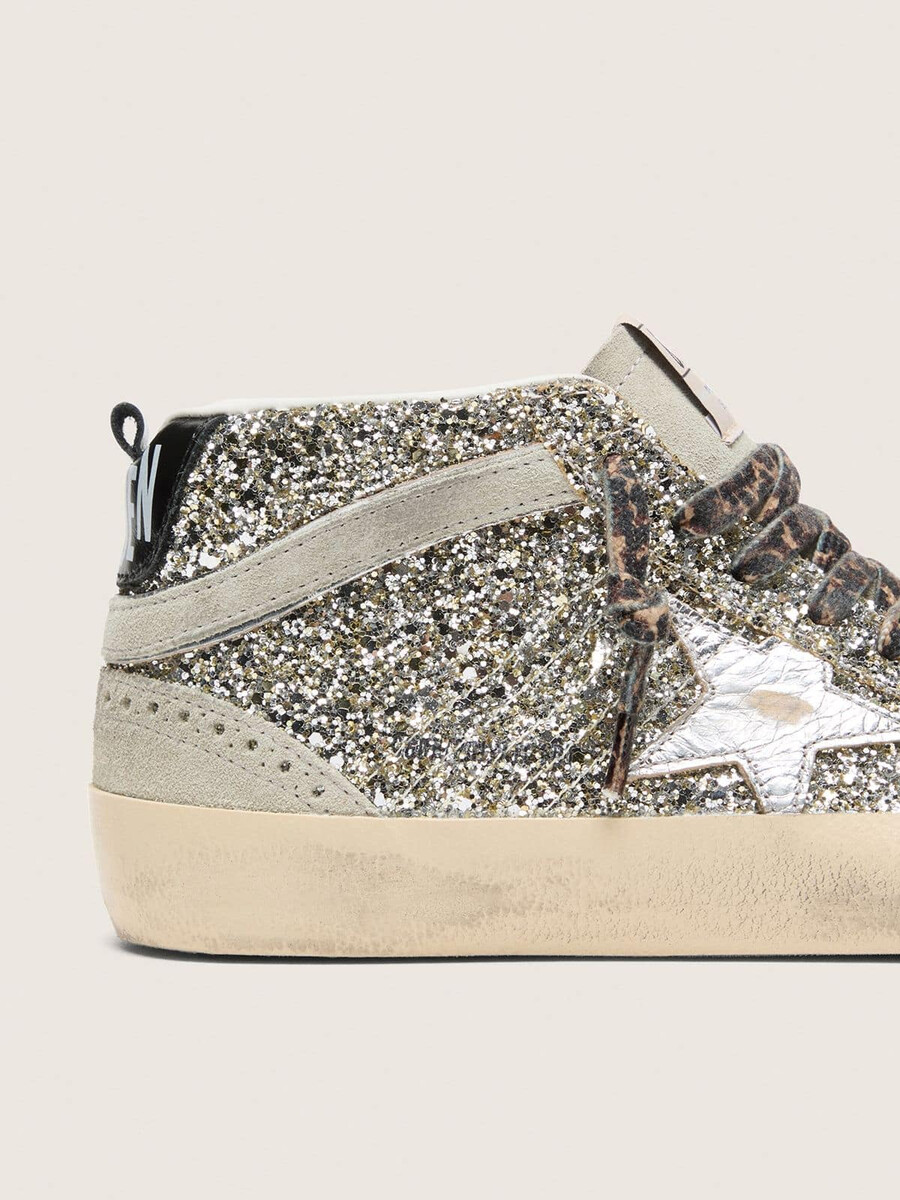 estrela mid star em glitter prateado com estrela de couro metálico prateado