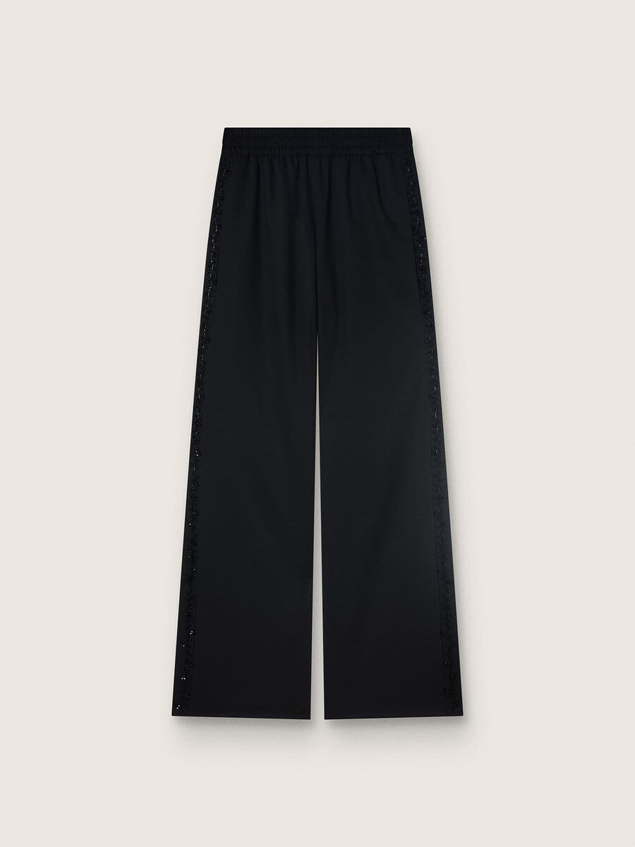 calça de moletom feminina em sarja de lã preta com bordado de lantejoulas