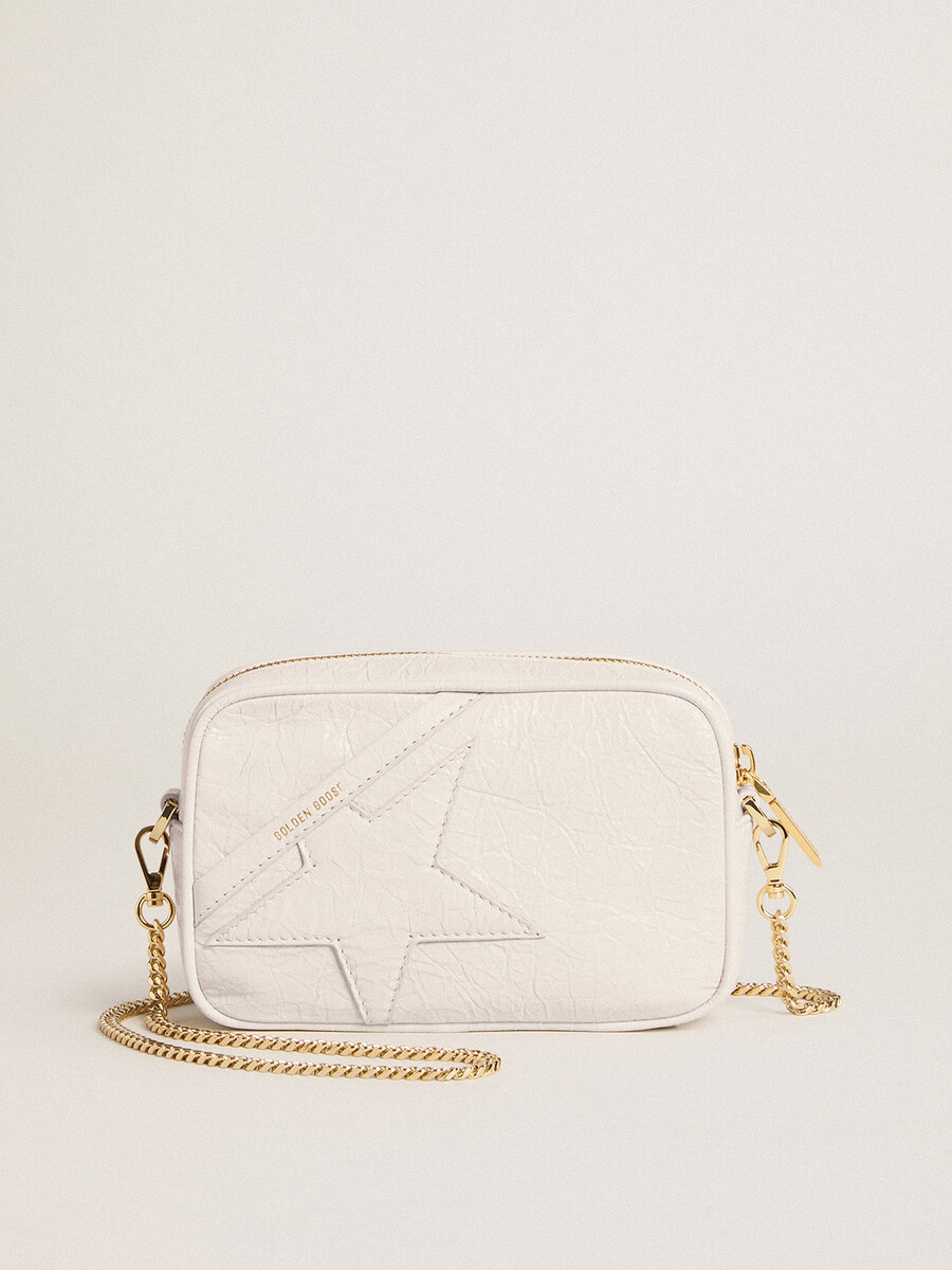 mini bolsa star em couro branco-manteiga com estrela tom sobre tom