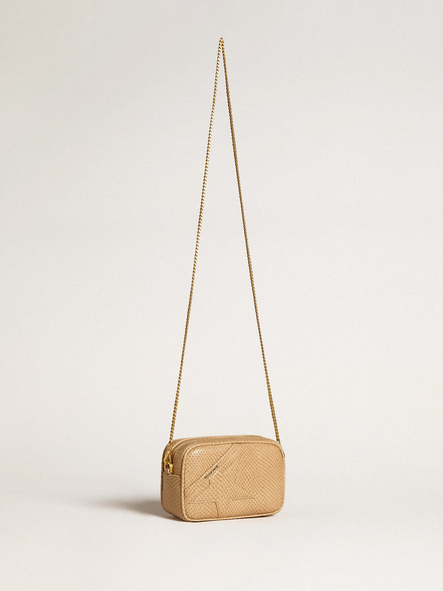 mini bolsa star em couro bege com estampa de cobra.