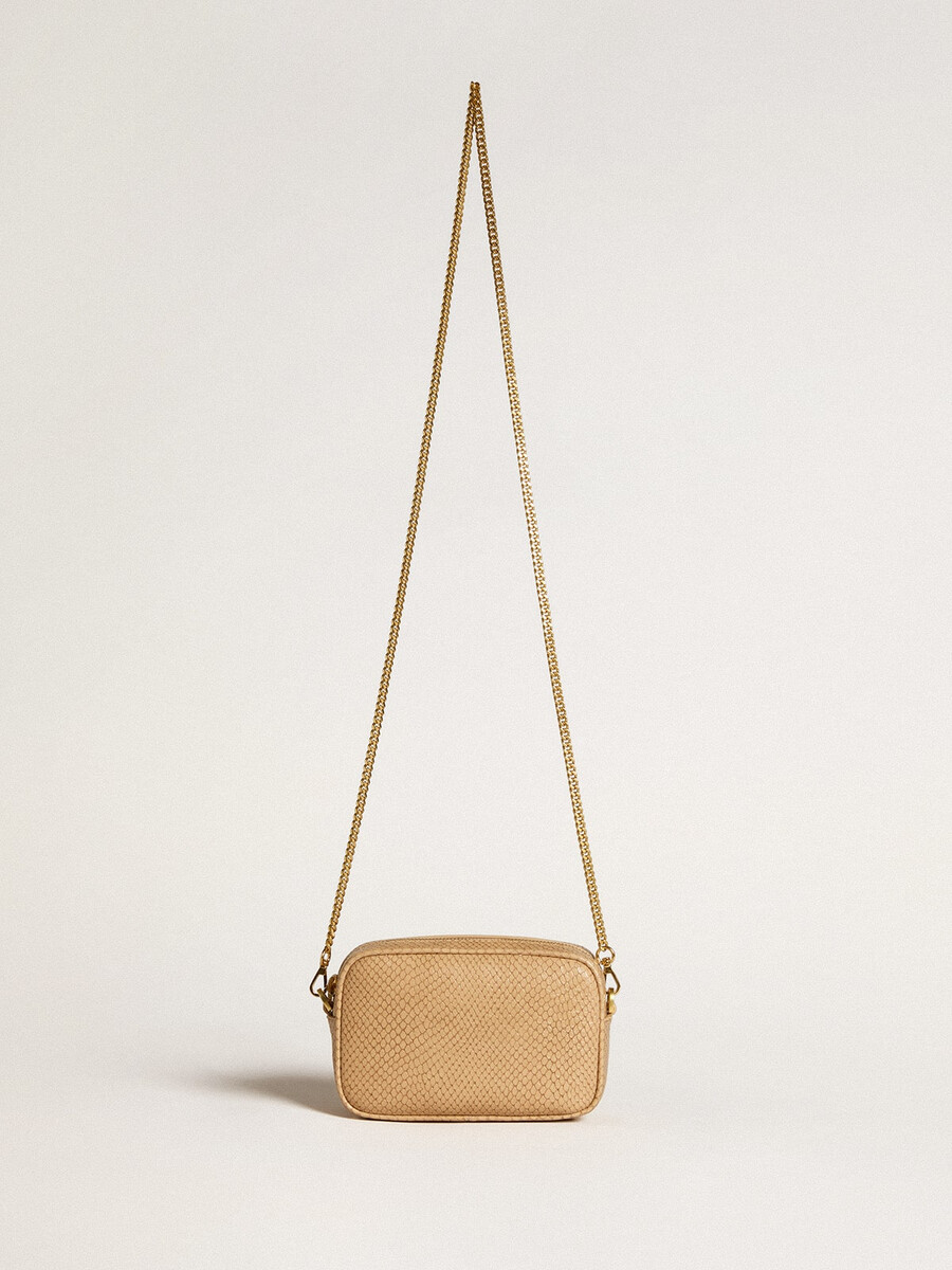 mini bolsa star em couro bege com estampa de cobra.