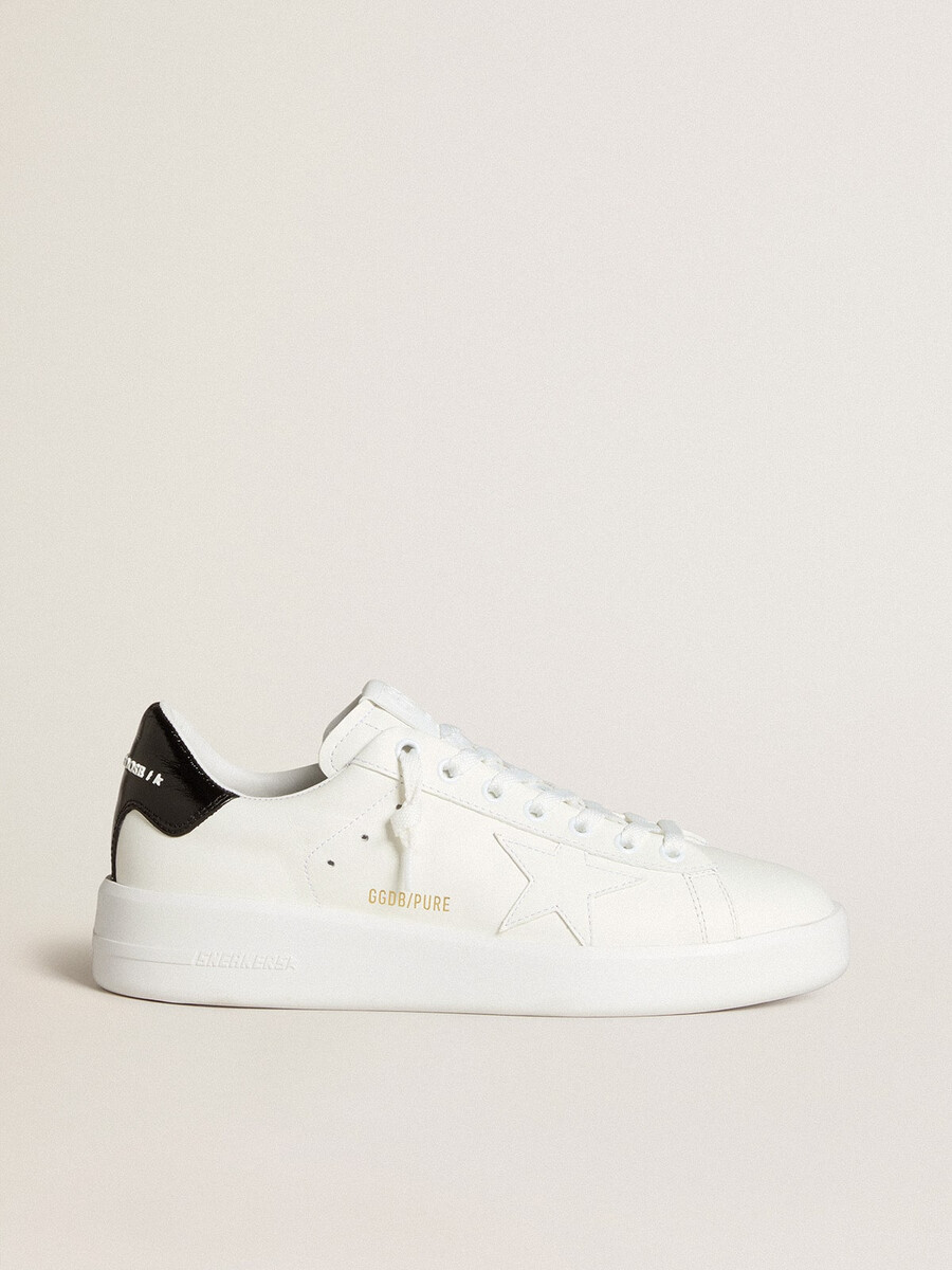 sapato feminino purestar com estrela de couro e detalhe de verniz preto no calcanhar.