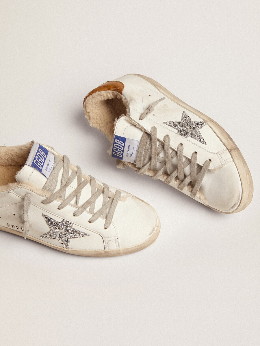 super-star feminino com forro de pele de carneiro e estrela prateada com glitter.