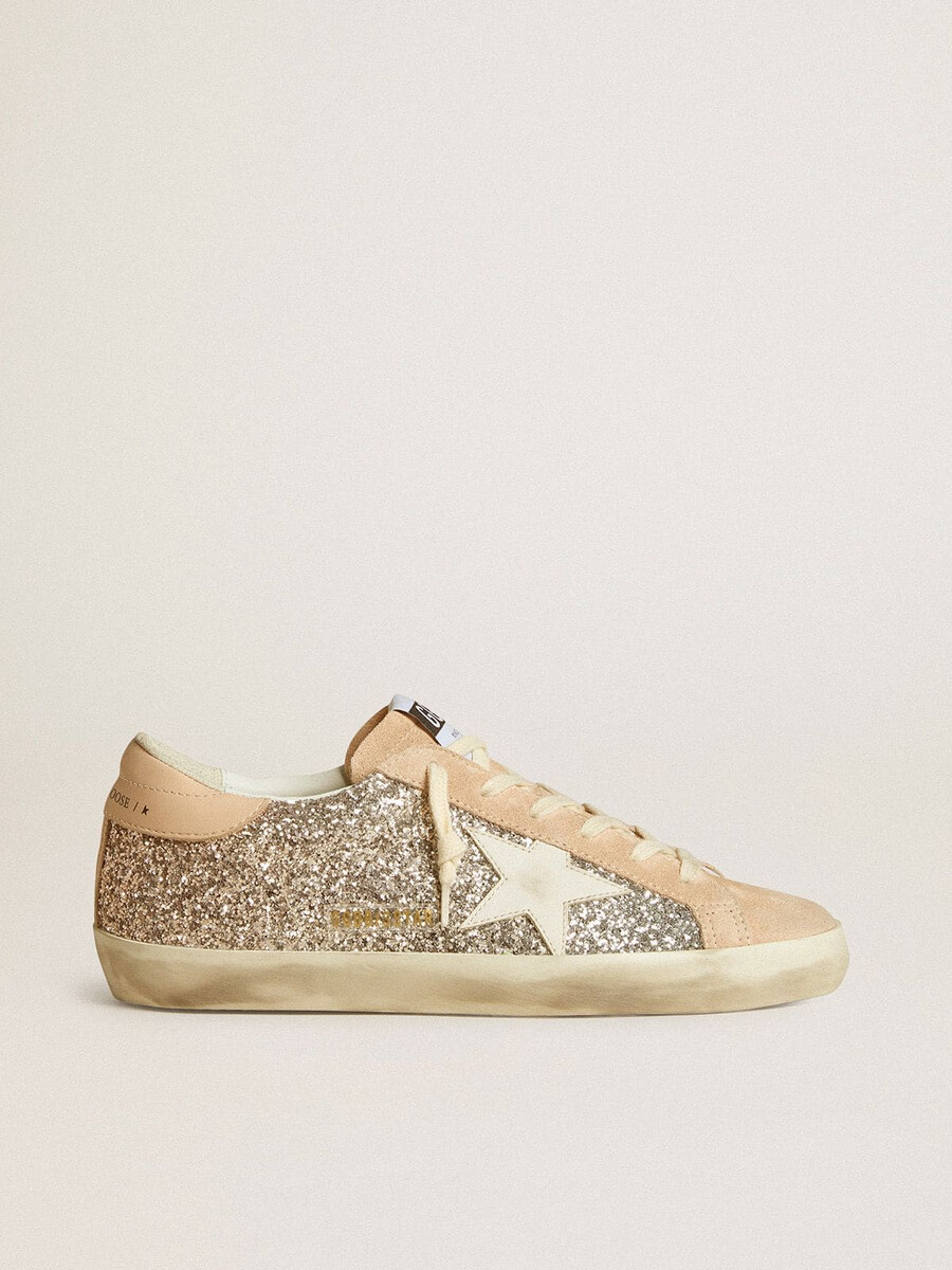 sapato feminino super-star em glitter prateado com estrela de couro e detalhe no calcanhar.