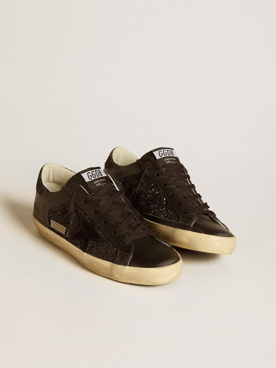 super-star feminino em glitter preto com estrela em camurça preta e detalhes em couro.