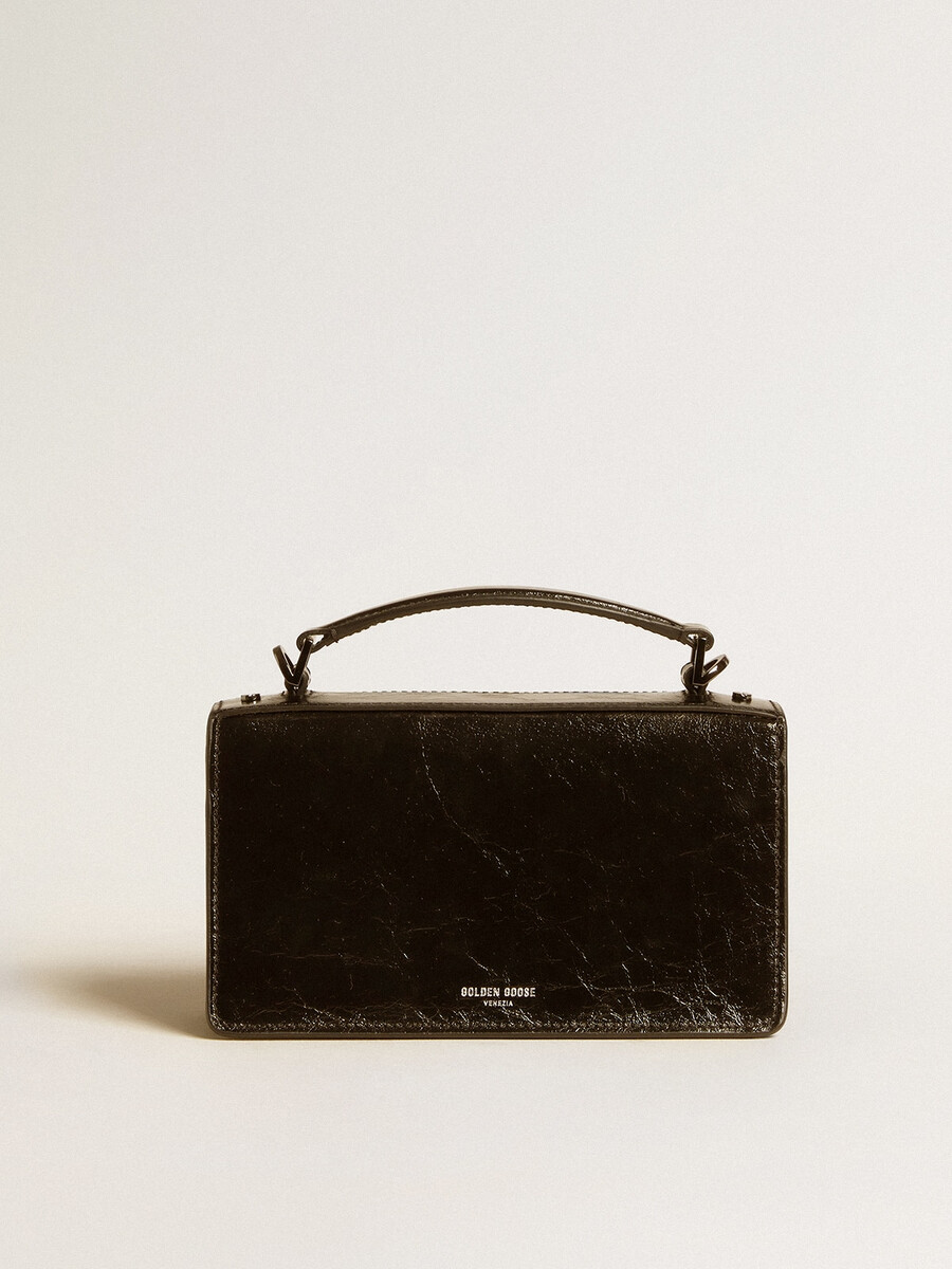 bolsa pequena venezia em couro metalizado preto com detalhes em preto.