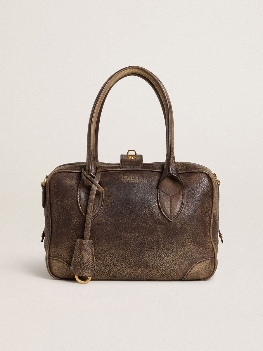 bolsa vita em couro vintage marrom com detalhes dourados.